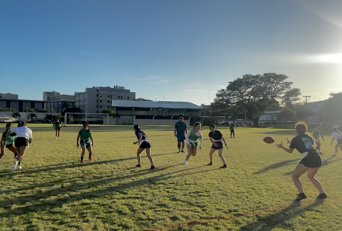 Mid-Pacific Girls' Flag Football team running drills at practice.